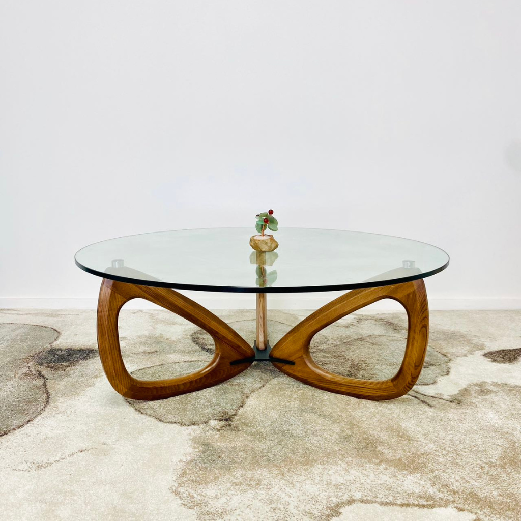 Flora Coffee Table, sculptural base with transparent glass tabletop.
