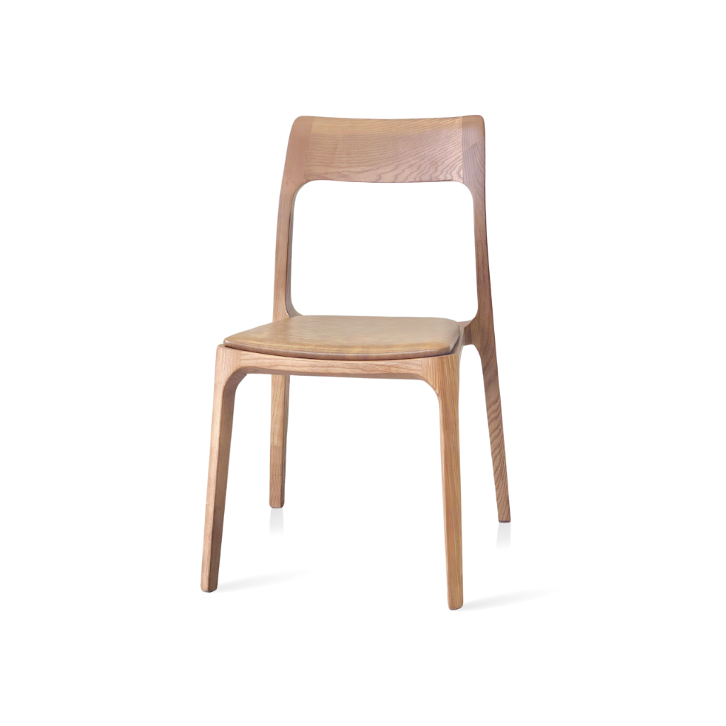 Archie Designer Side Chair, solid ash frame in Walnut stain with distressed Camel faux leather seat upholstery.